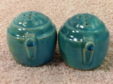 Early barrel shakers glazed turquoise.
